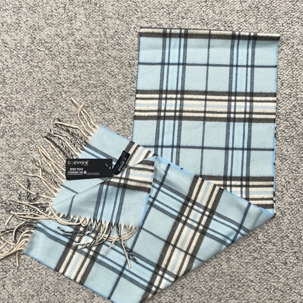 Cashmink scarf. In Light blue plaid  new with tag